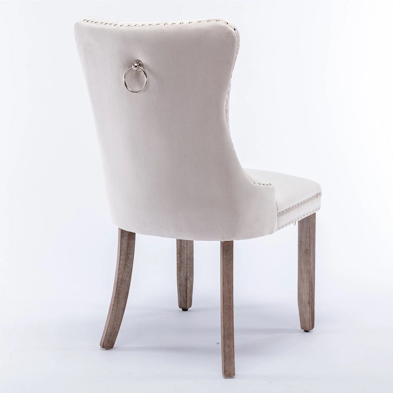 Chaise de salle à manger contemporaine haut de gamme en velours capitonné avec pieds en bois et clous décoratifs, lot de 2 pièces.